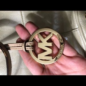 Tan/cream colored Michael Kors purse